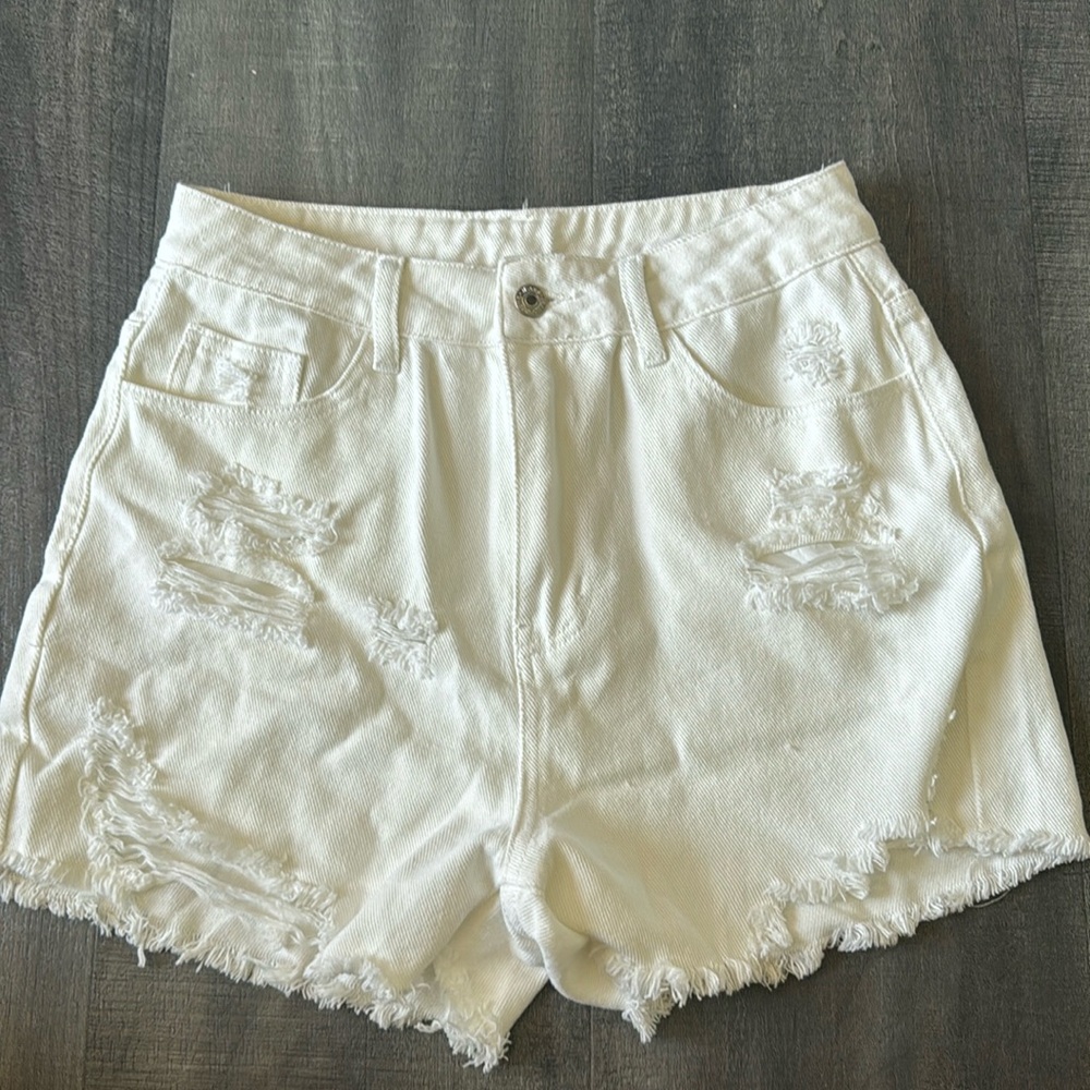 Ripped jean shorts. High-waisted.